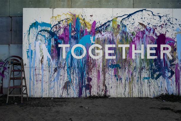 A painting featuring the word 'together'