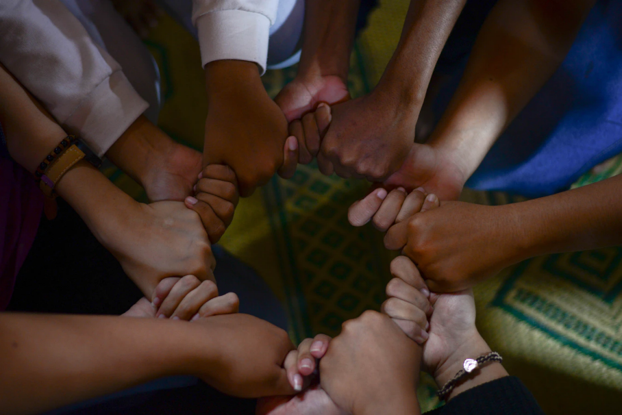 A circle of hands